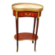 Louis XVI period pedestal table, in solid mahogany and veneer, and in gilded bronze.