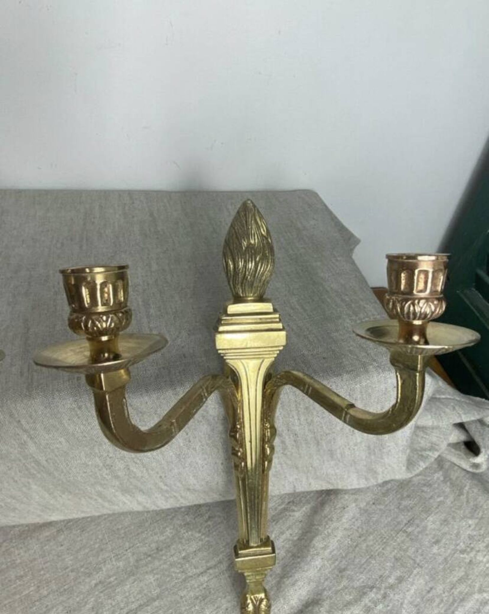 Pair of wall candle holders in bronze