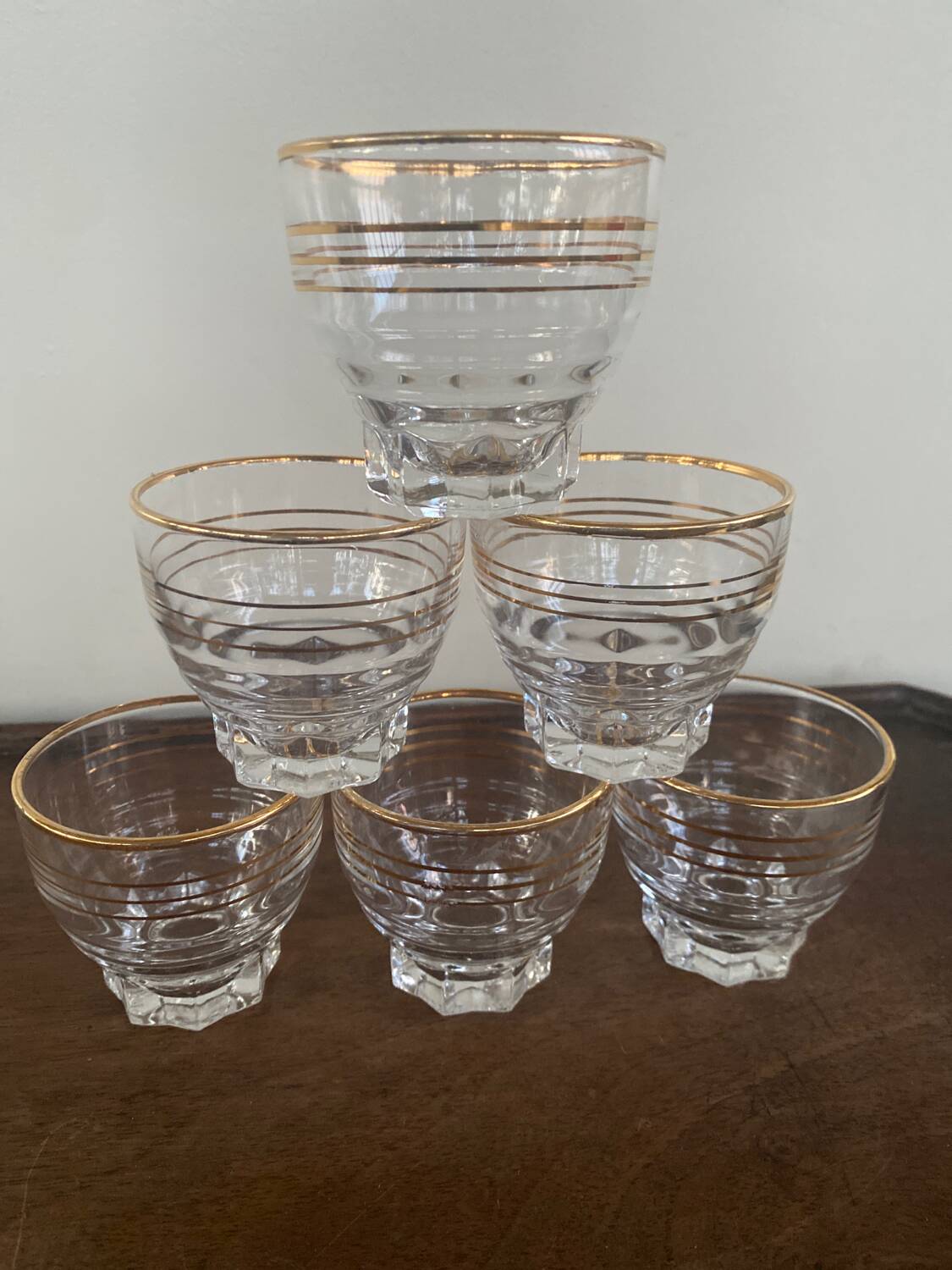 6 small golden glasses
