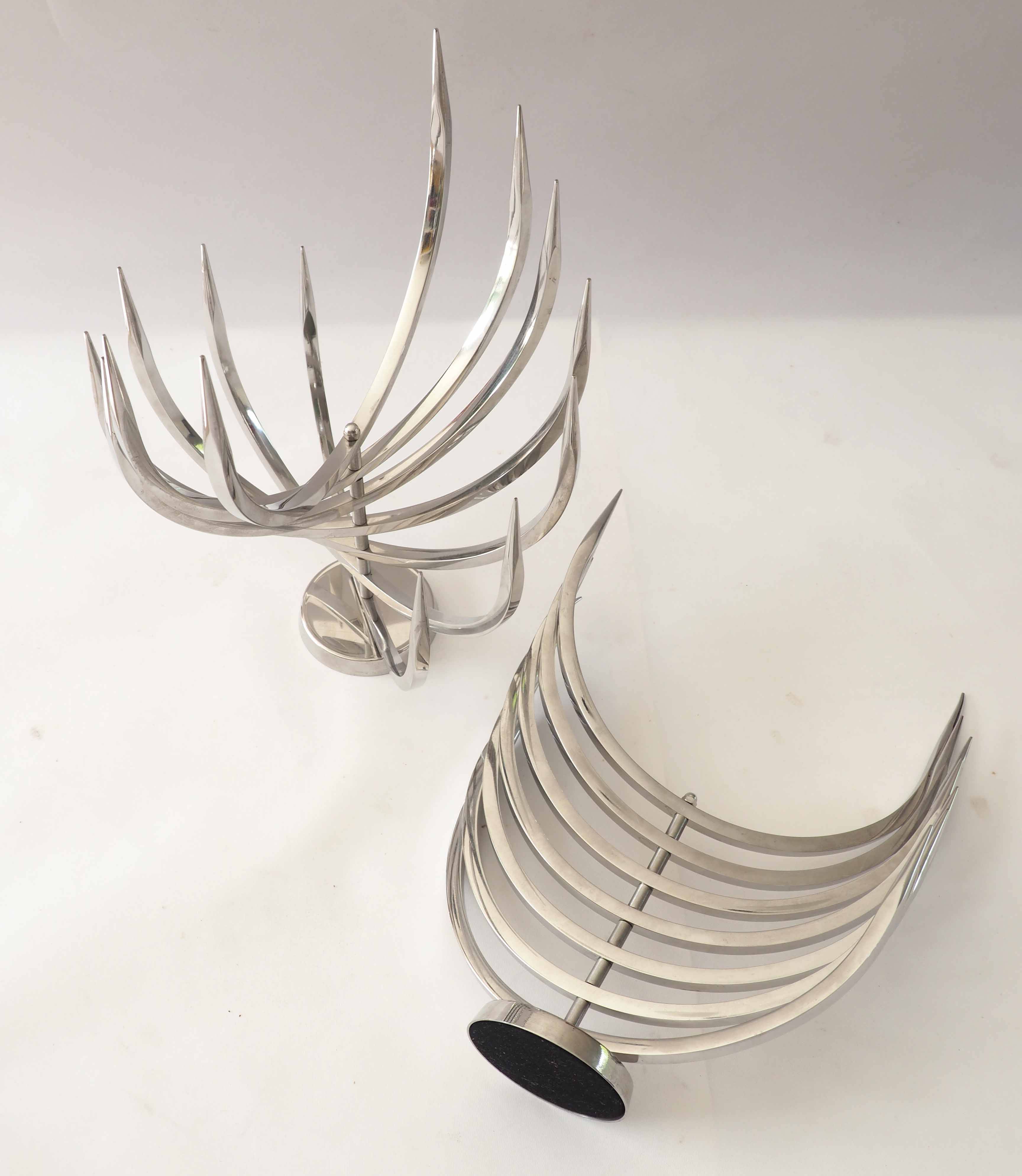 Pair of X Feal candlesticks