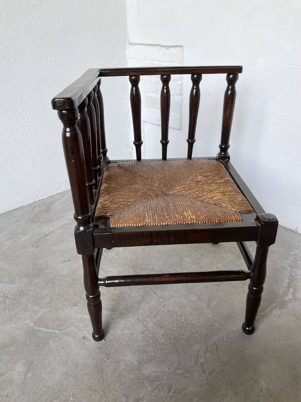 Straw chair by the fireside 1900