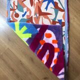 Tapis graphique tufté