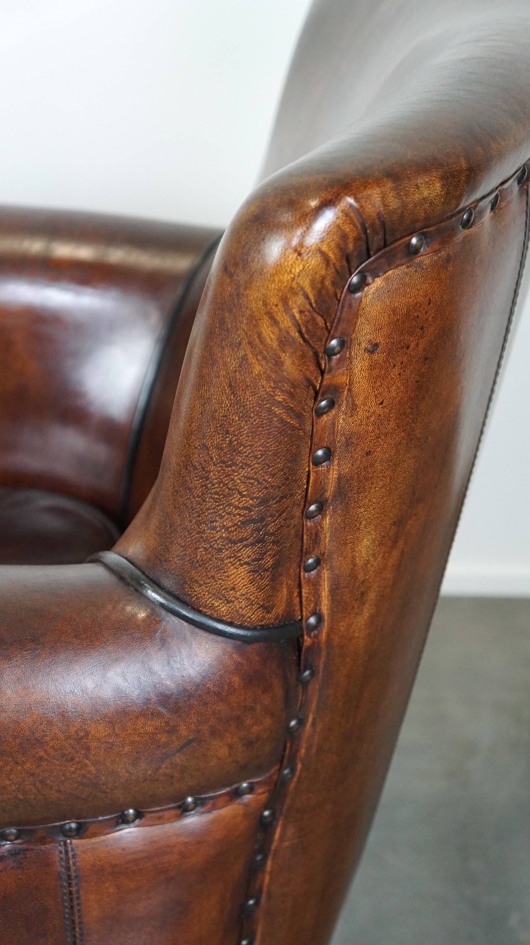 Stylish sheepskin leather armchair with a refined appearance