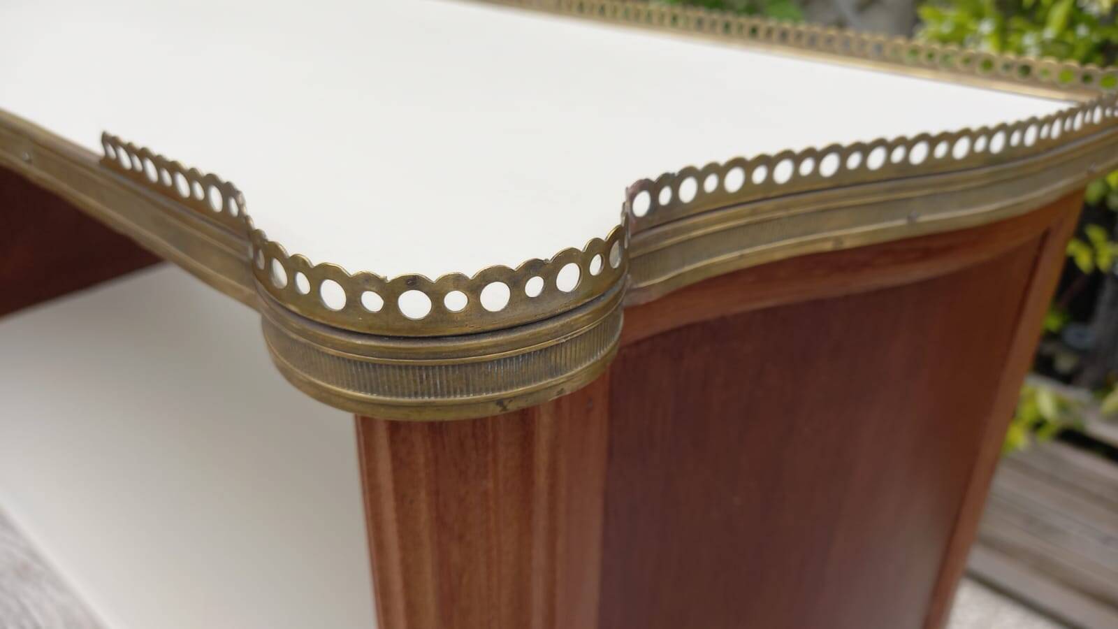 Wall shelf bookcase with brass frieze