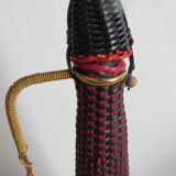 Red and black scoubidou bottle