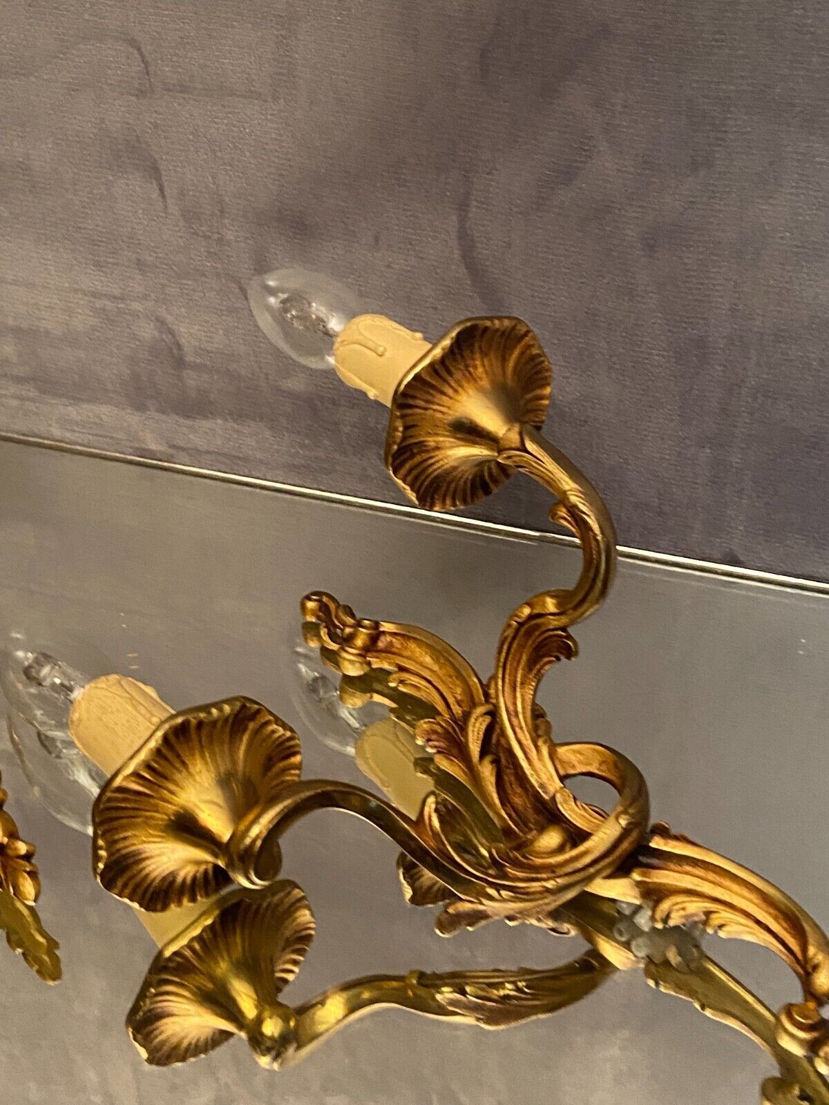 Pair of Louis XV style gilded bronze sconces