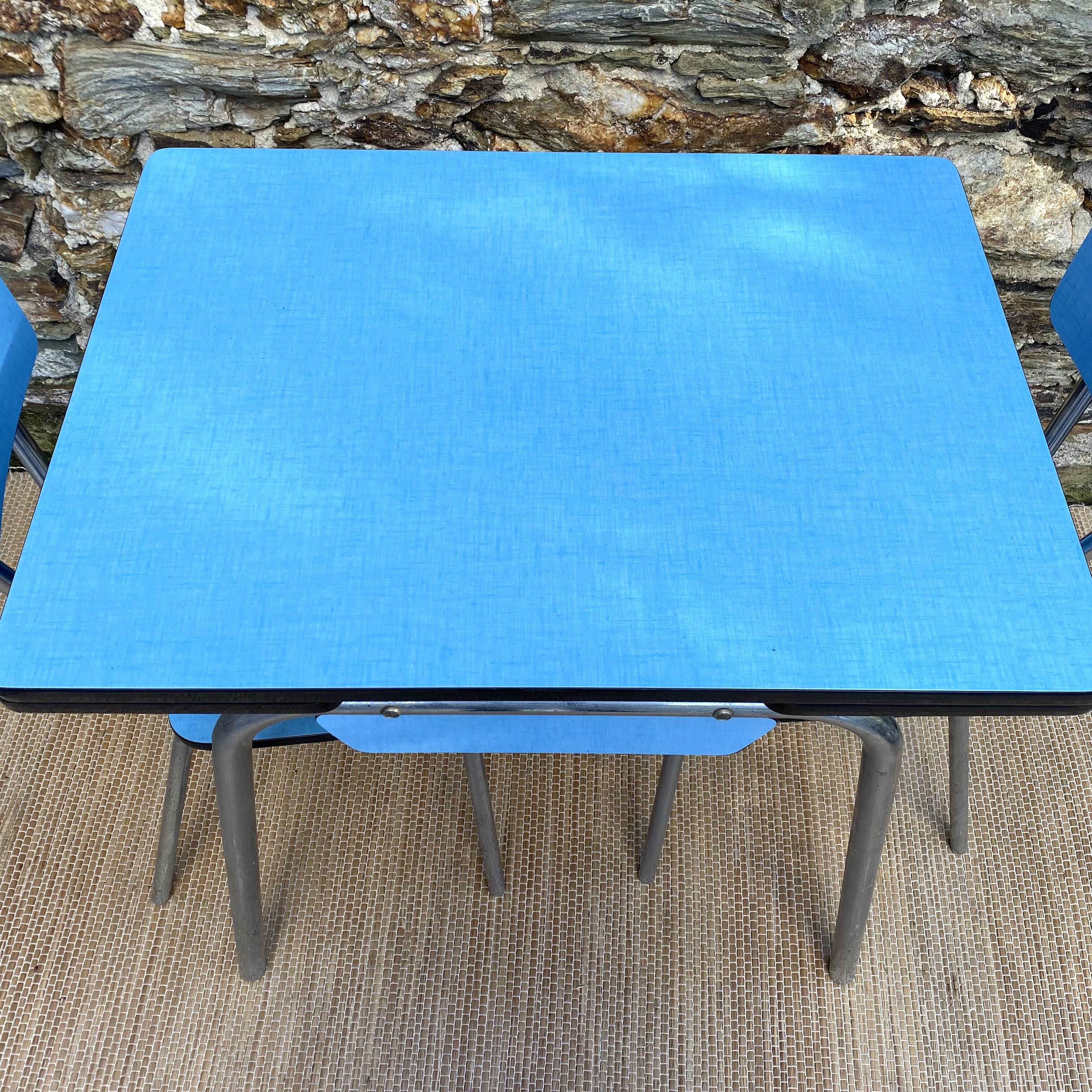 Extendable blue formica table and 2 chairs, 1960s