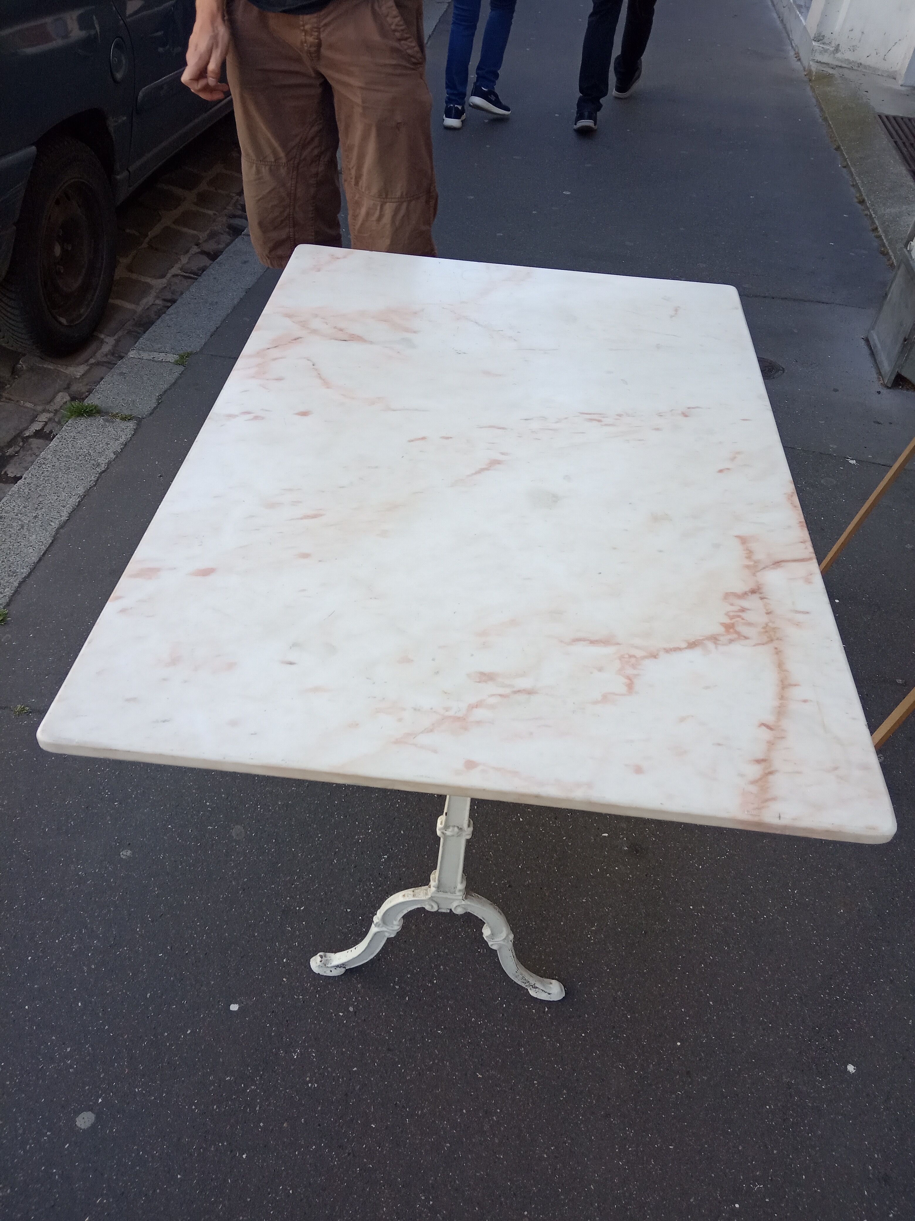 White bistro table in marble and cast iron