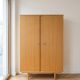 Vintage 1950s cabinet with tapered legs, wood.