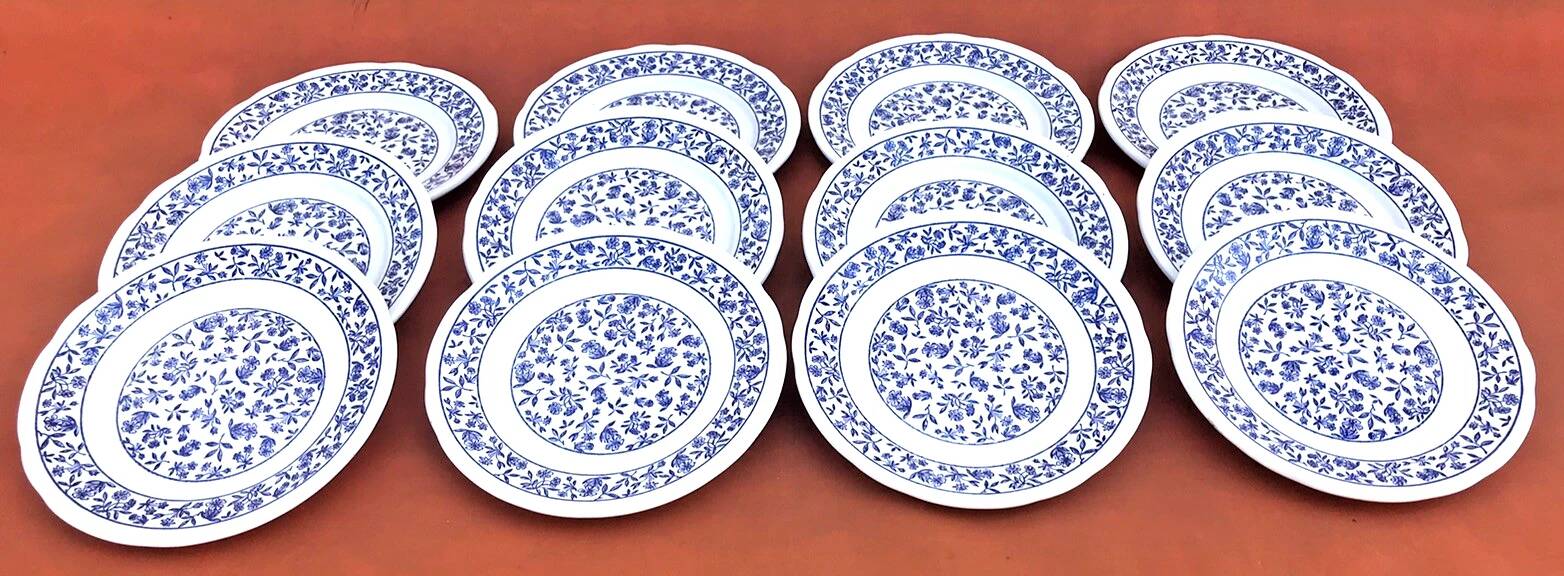 12 ceramic cheese/dessert plates with floral decoration