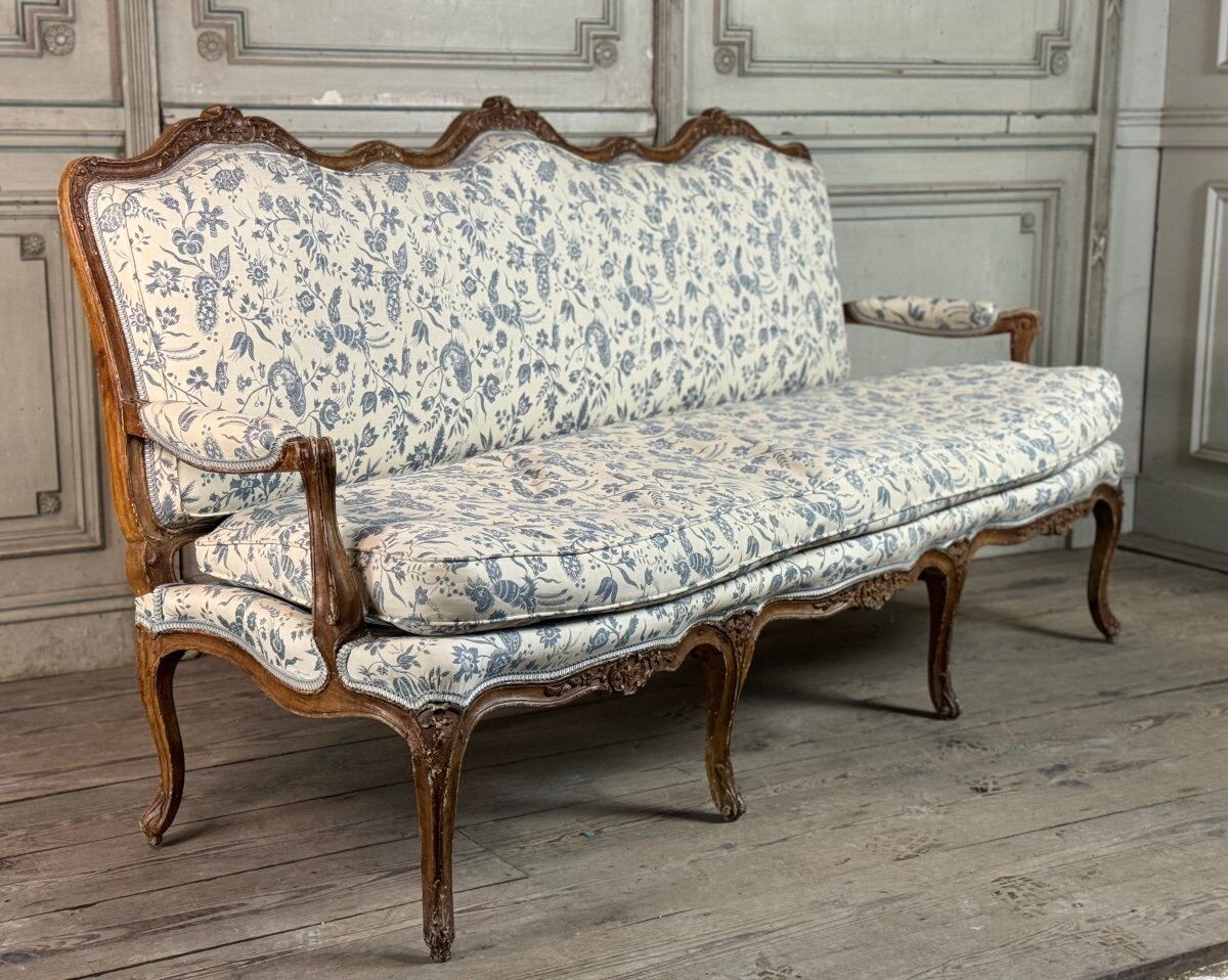 Louis XV bench in carved wood with oak patina, 18th century