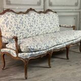 Louis XV bench in carved wood with oak patina, 18th century