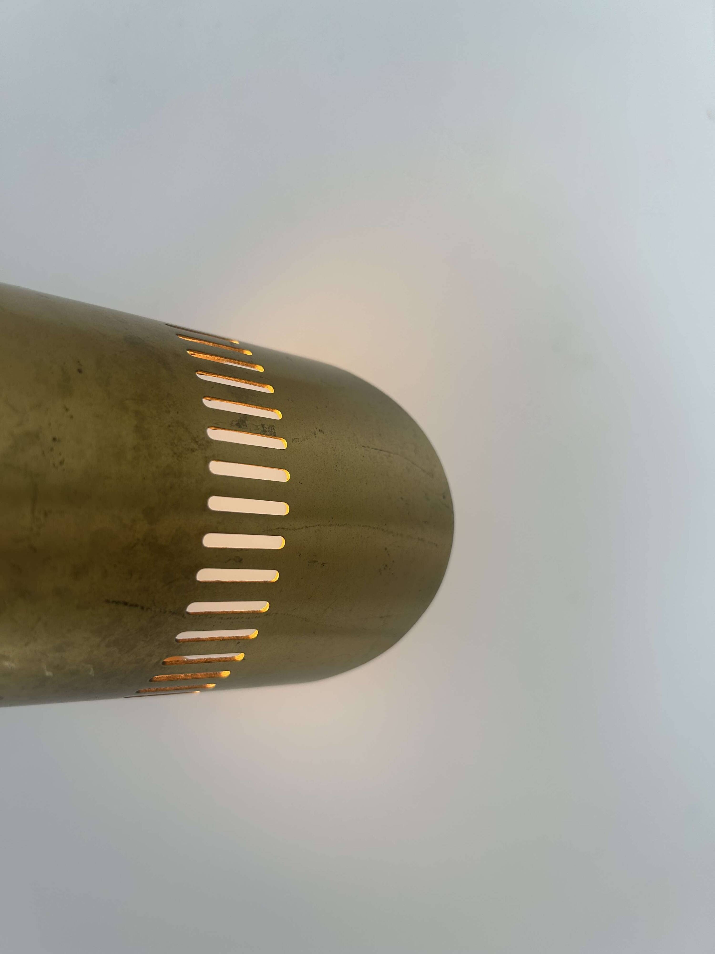 Vintage adjustable wall light, solid perforated brass, France 1960