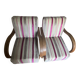 A pair of Art Deco armchairs in very good condition.