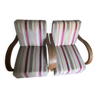 A pair of Art Deco armchairs in very good condition.