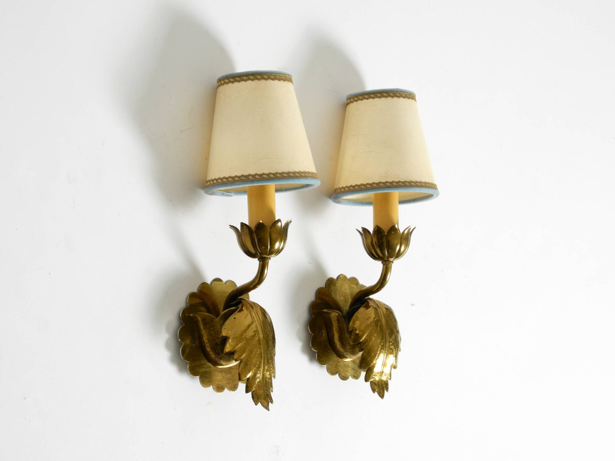 Two beautiful original Mid Century Modern floral wall lamps made of brass w