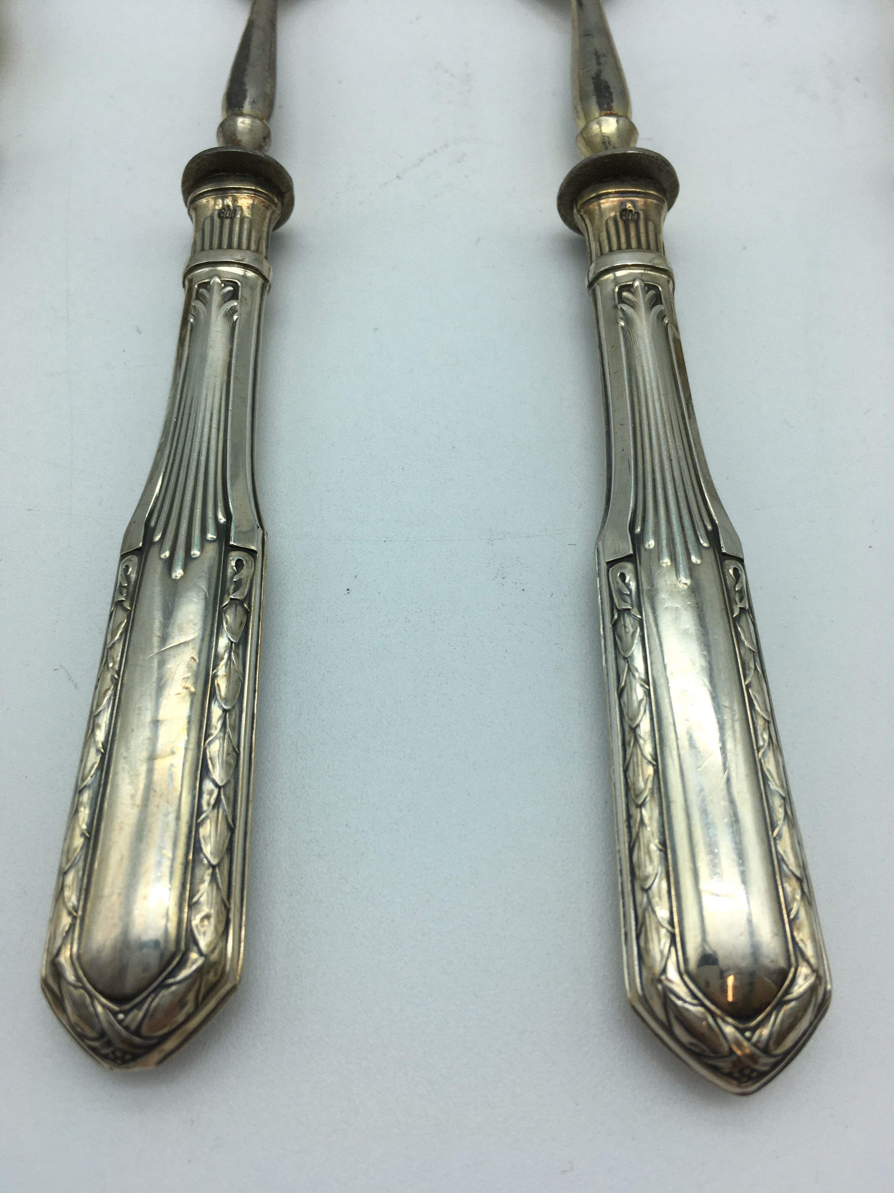 Box of filled silver salad cutlery