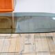 Oval coffee table in smoked glass and chrome, original double S design base, 1970.