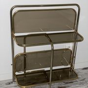 Golden tubing bar and smoked glass top circa 60/70
