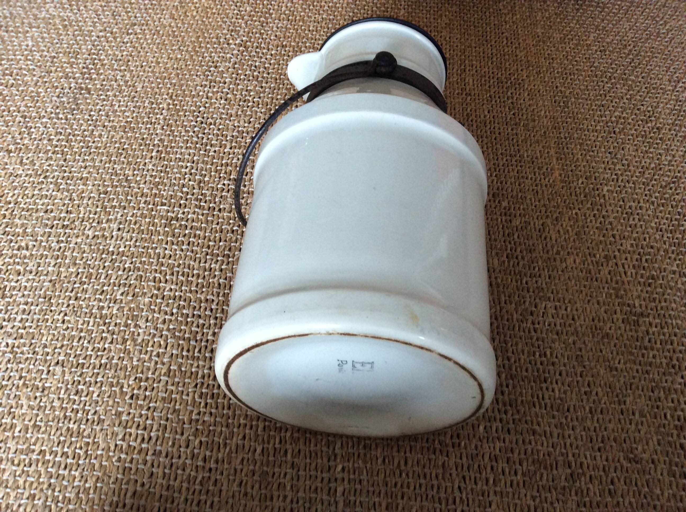 Antique milk jug