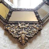 Old octagonal mirror with brass glazing beads
