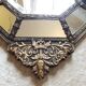 Old octagonal mirror with brass glazing beads
