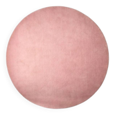 Polspotten round rug in bubble gum colour.
