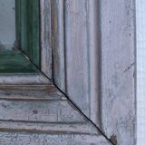 Beveled mirror patinated wood early 20th century