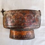 Red copper pot cover on piedouche
