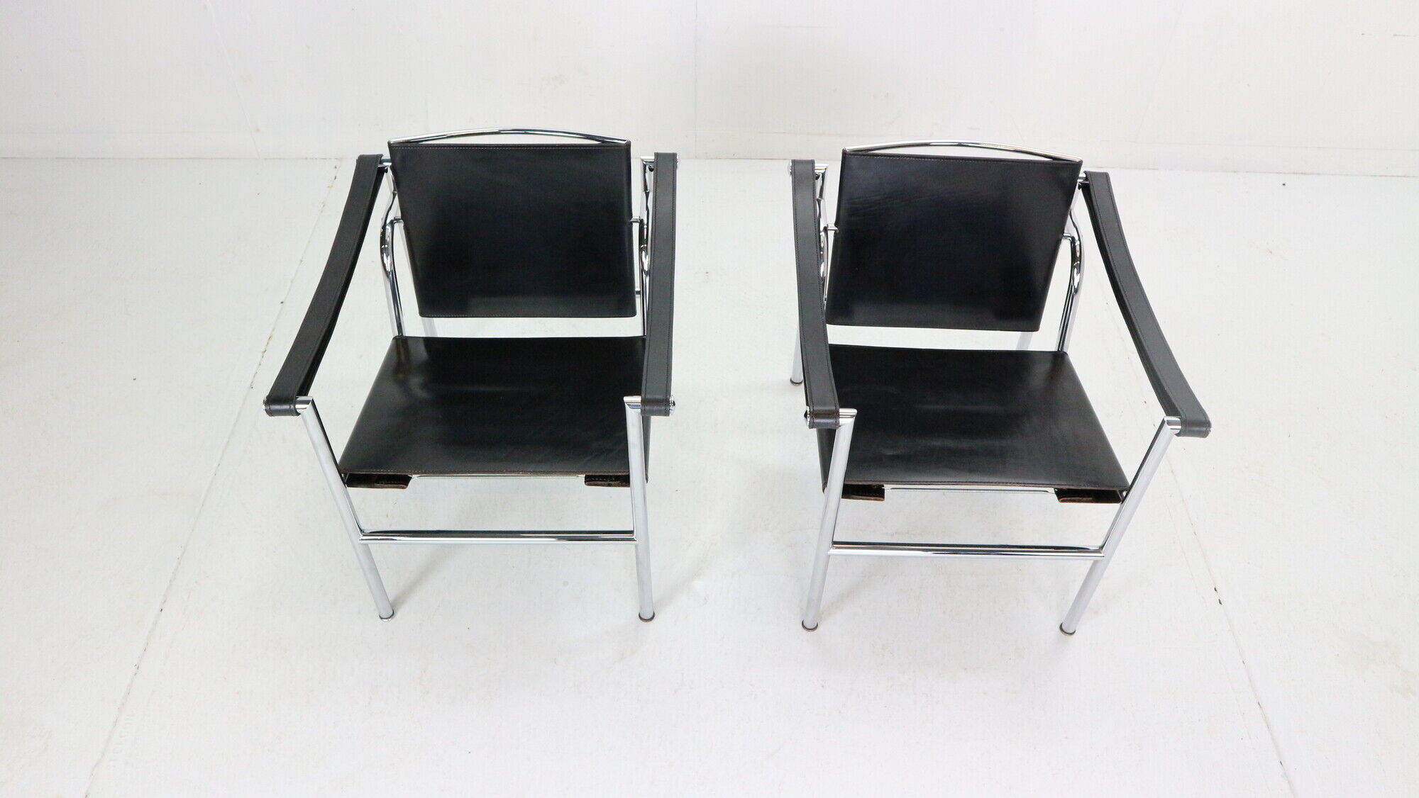 Le Corbusier Set of 2 Black Leather Armchairs Model- LC1 for Cassina, 1970s