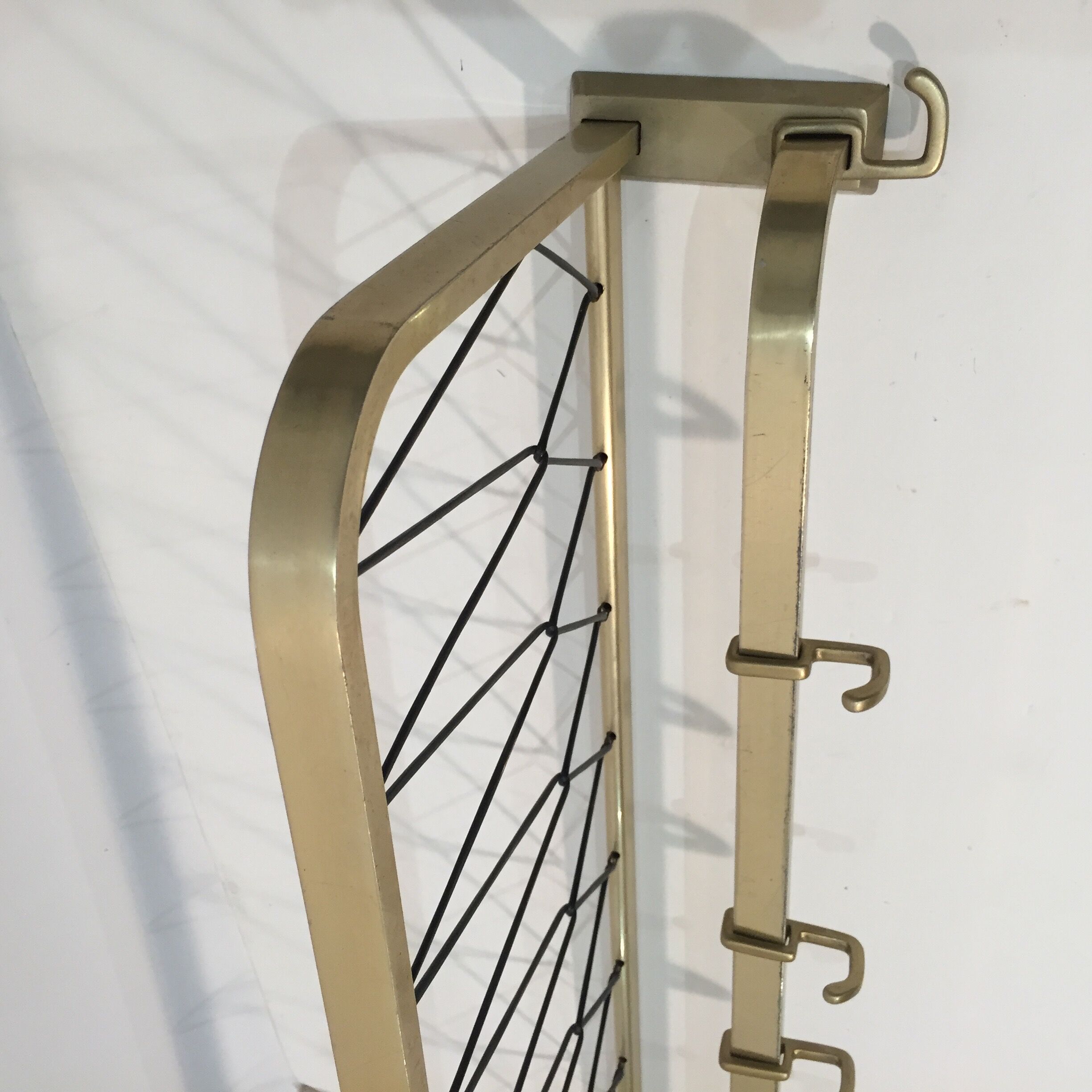 Golden wall coat rack