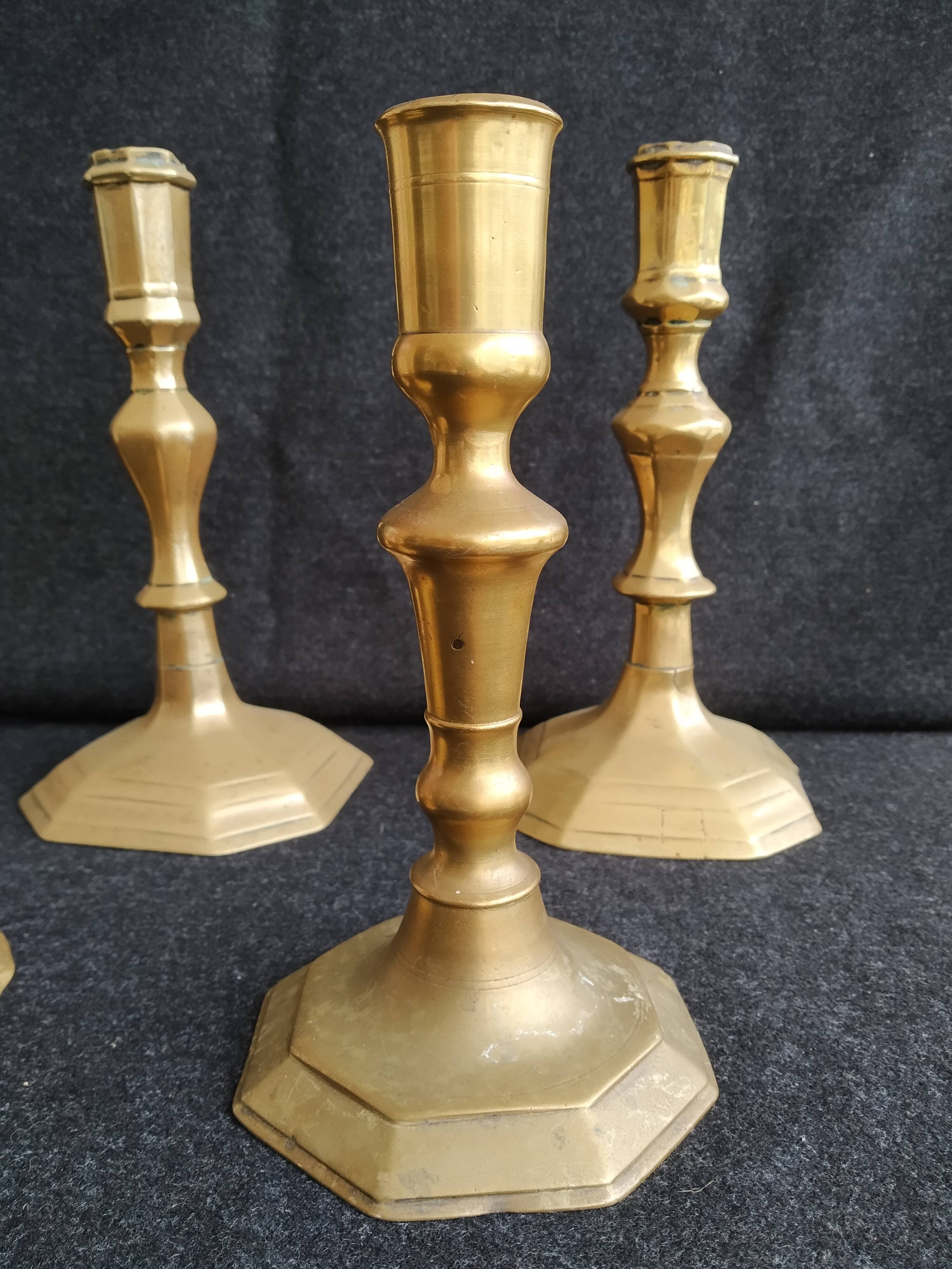 Batch of 5 brass candlesticks
