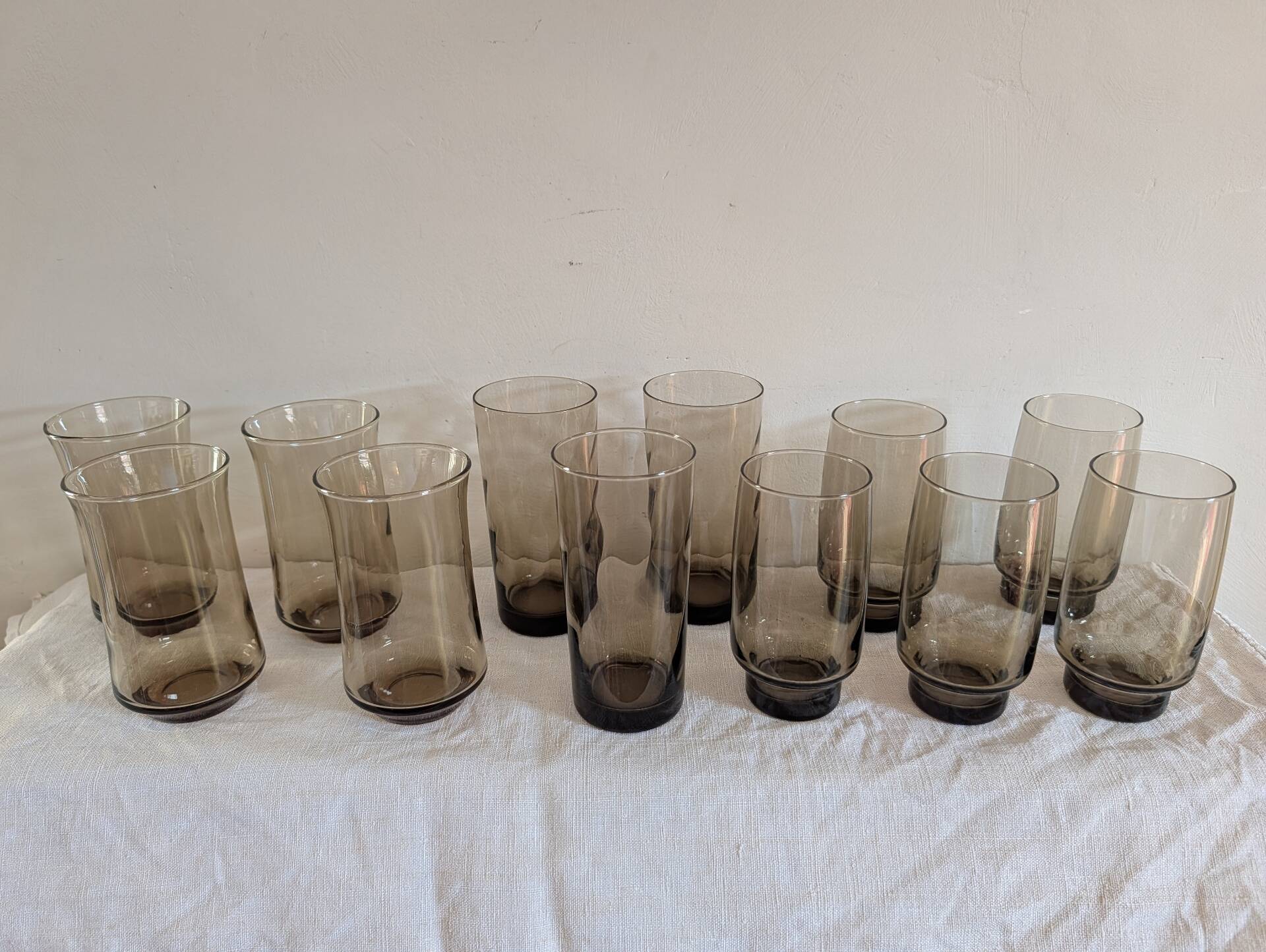 12 long drink glasses in smoked glass – 1970s
