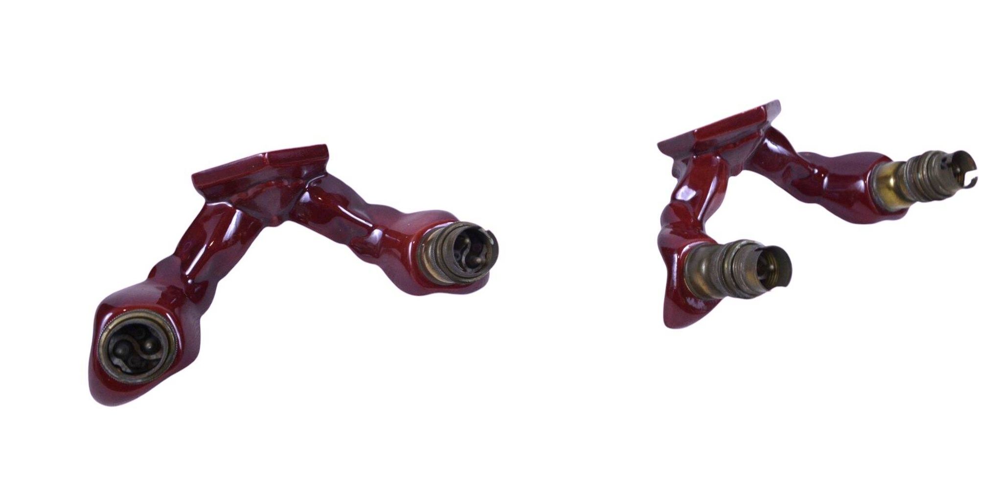 Pair of art deco wall lights in carmine red / burgundy earthenware.