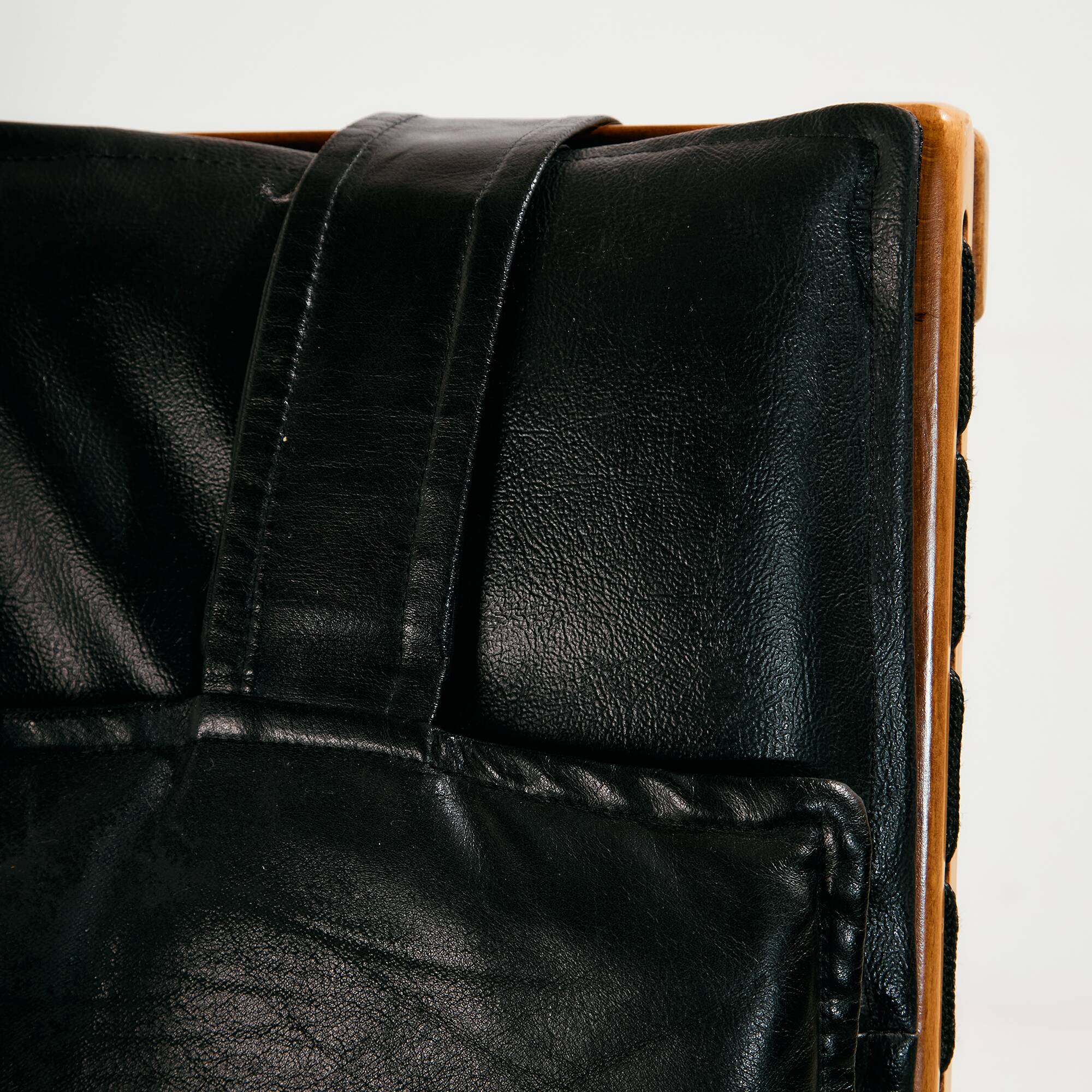 Beech armchair with leather upholstery