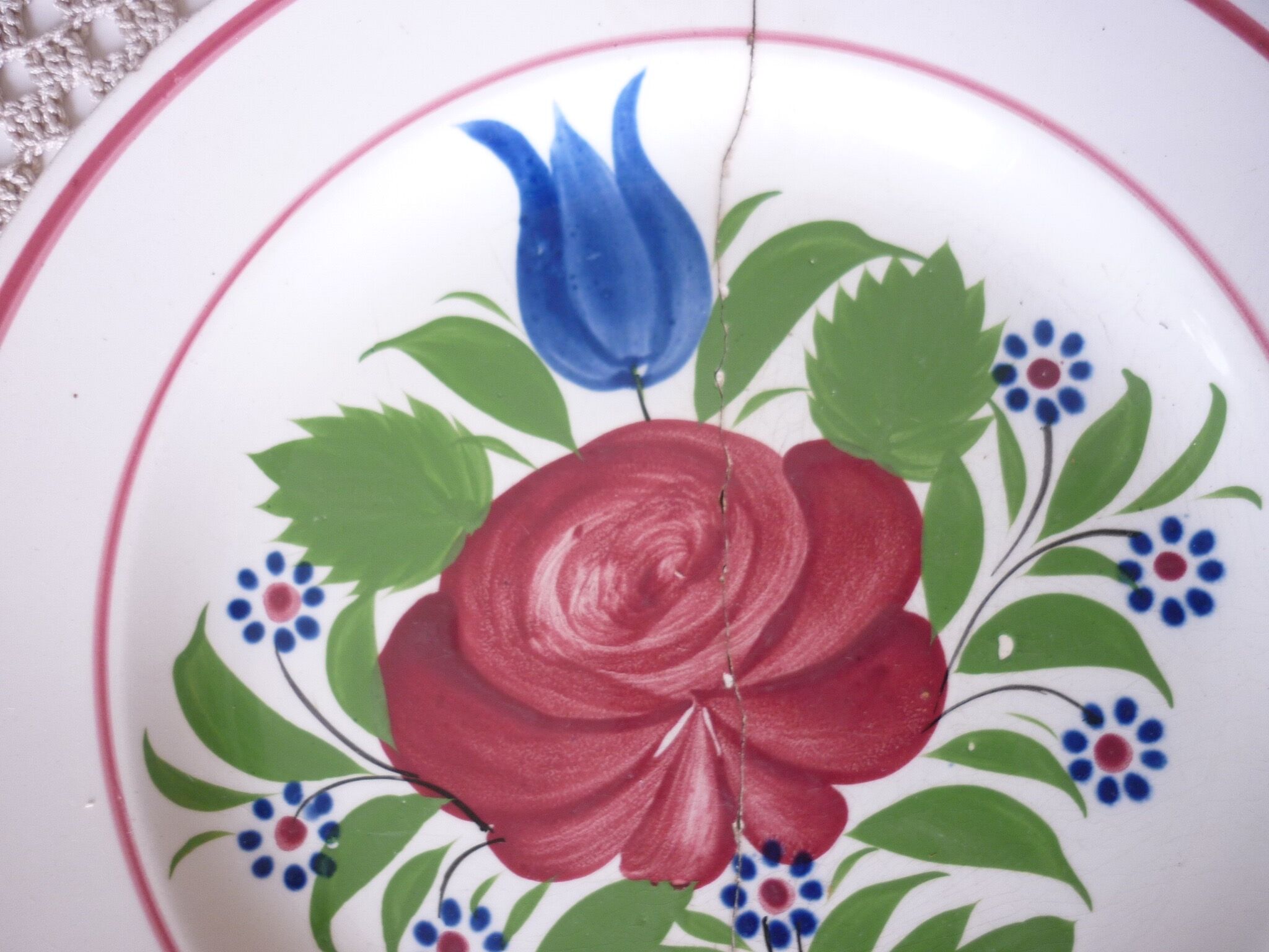 Old repaired plate stapled