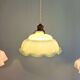 Trio of Art Deco pendant lights in scalloped opaline, 1920-30