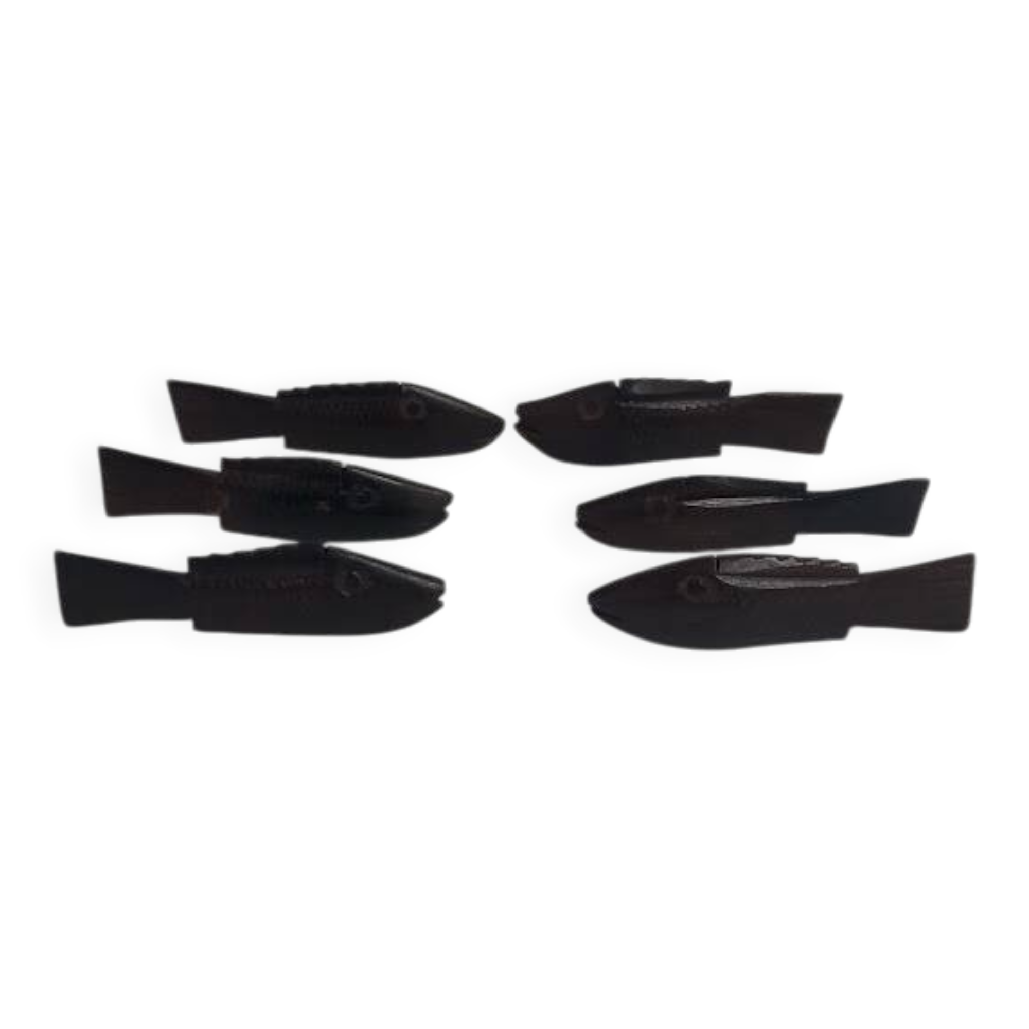 Antique wooden knife rests.