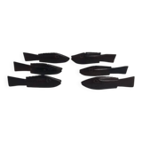 Antique wooden knife rests.