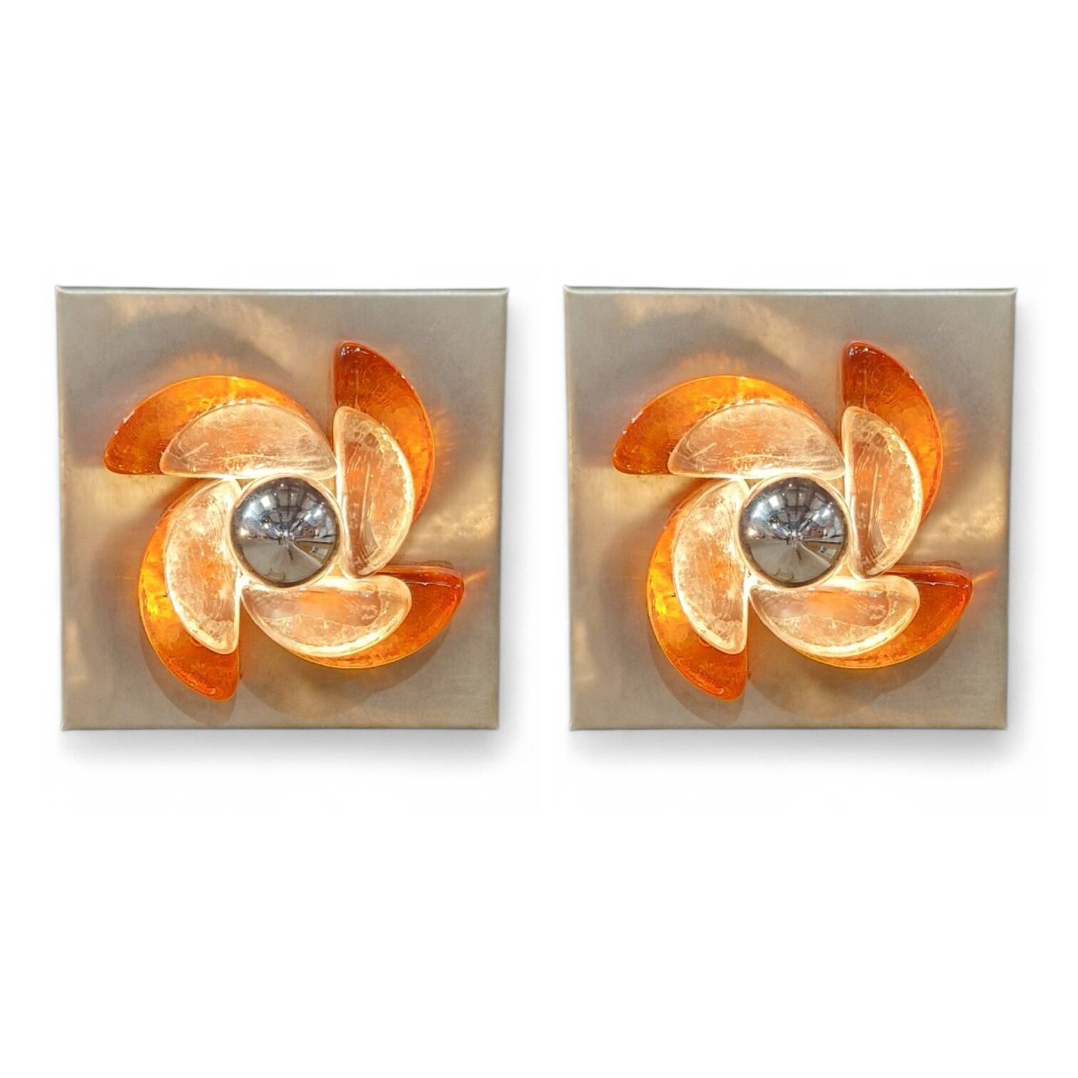 Pair of sculptural wall lights in moulded glass and metal