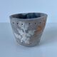 Signed ceramic pot with plant decoration