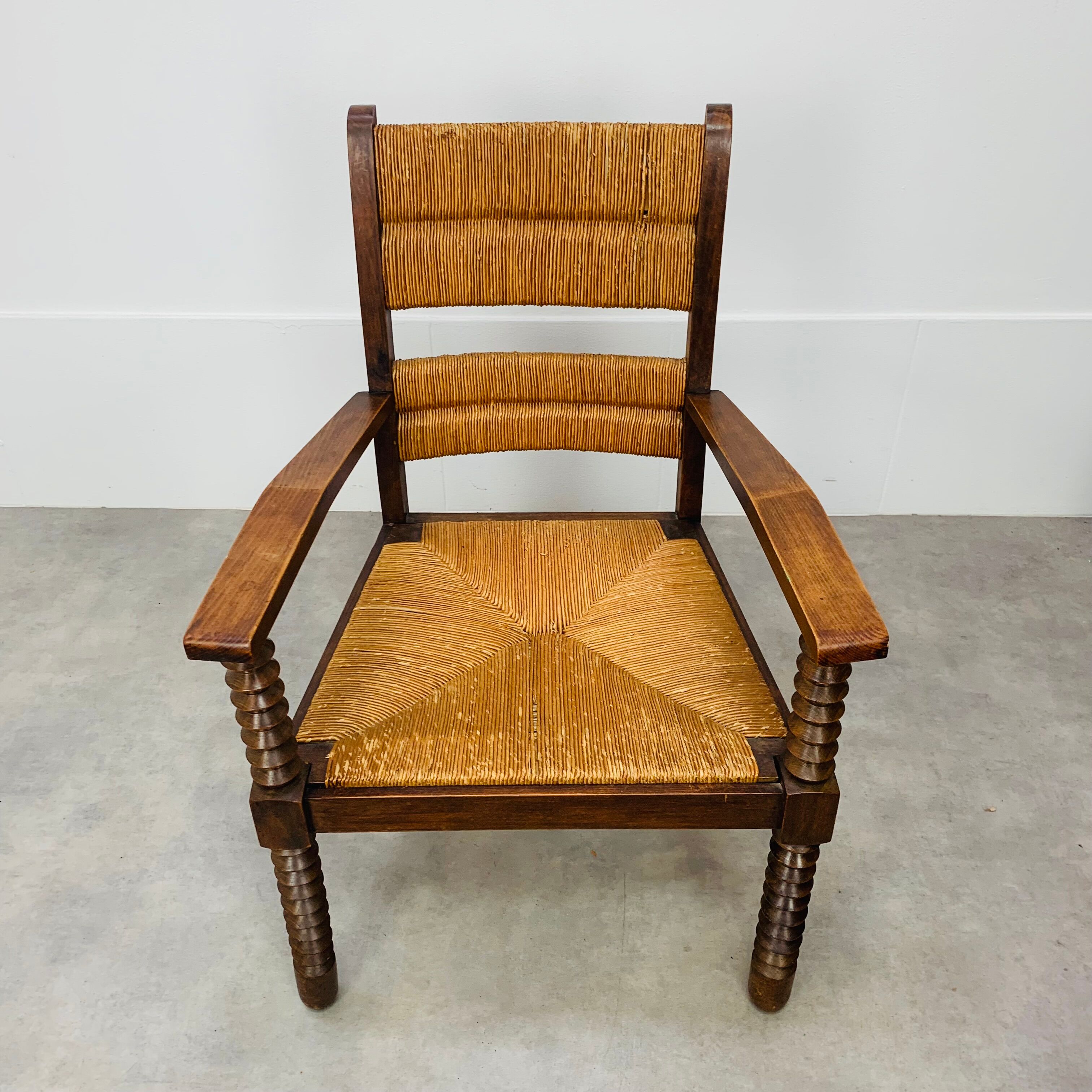 Straw and wood armchair brutalist art deco