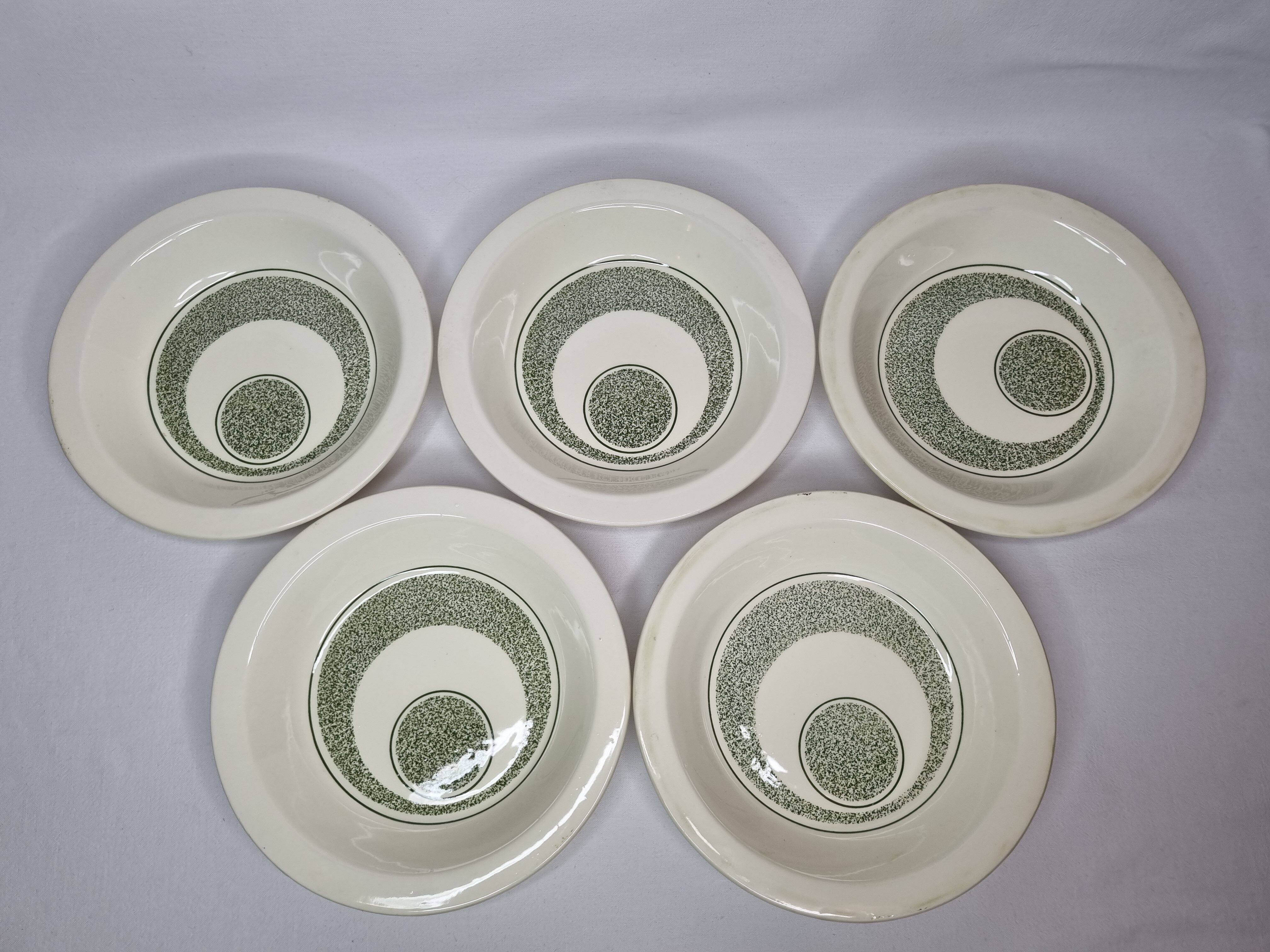 Set of five hollow plates, OpArt, 70s of the faience factory of Gien