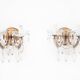 A pair of crystal sconces, France.