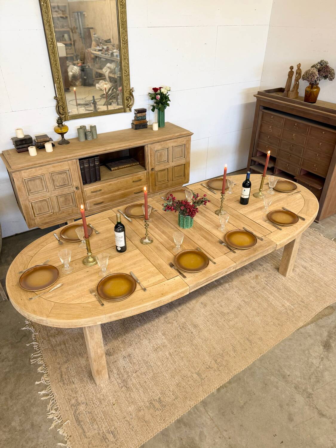 Oval farmhouse table in solid oak with extensions.
