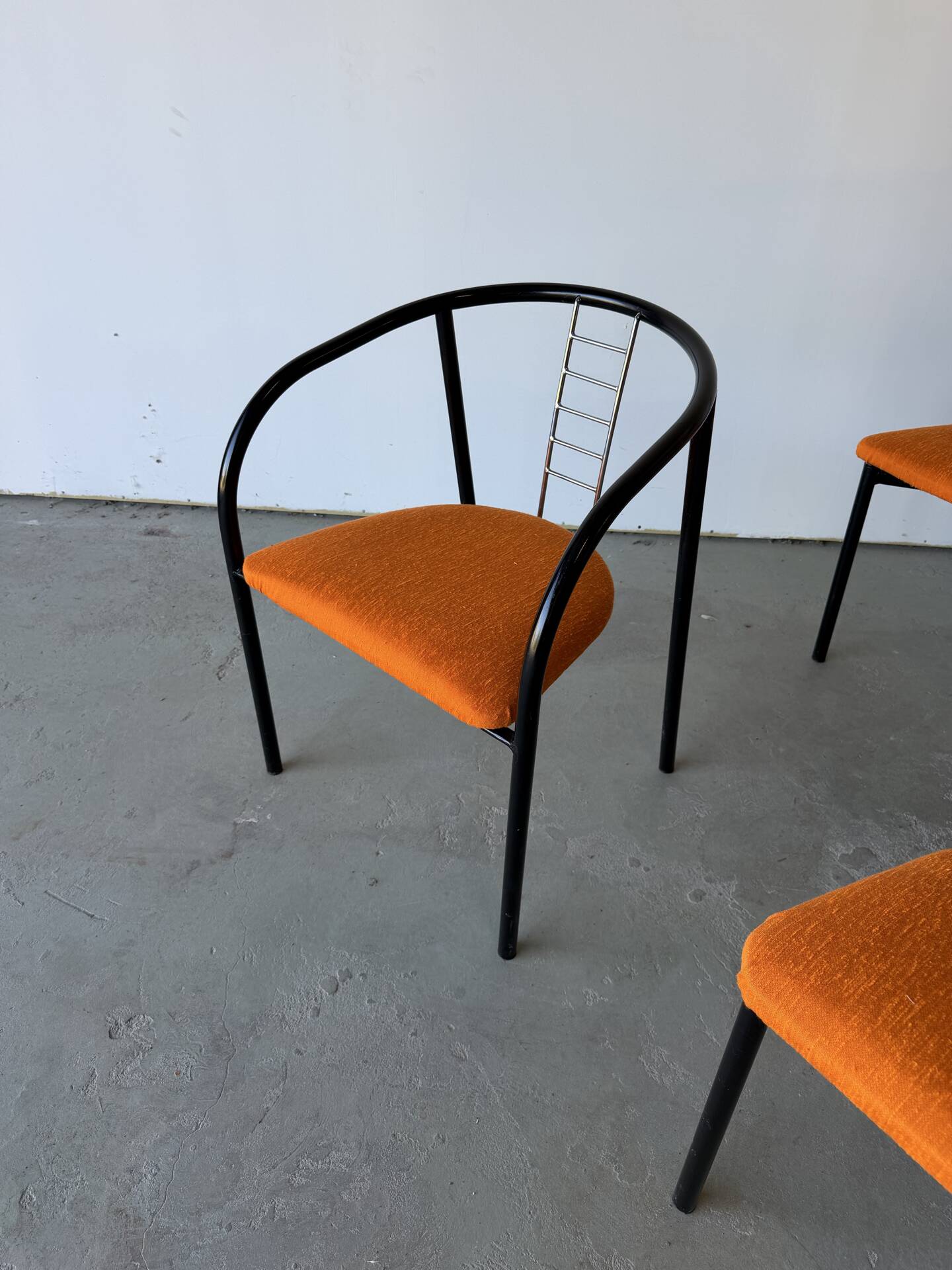 Set of 4 Italian design chairs in vintage black metal and chrome.