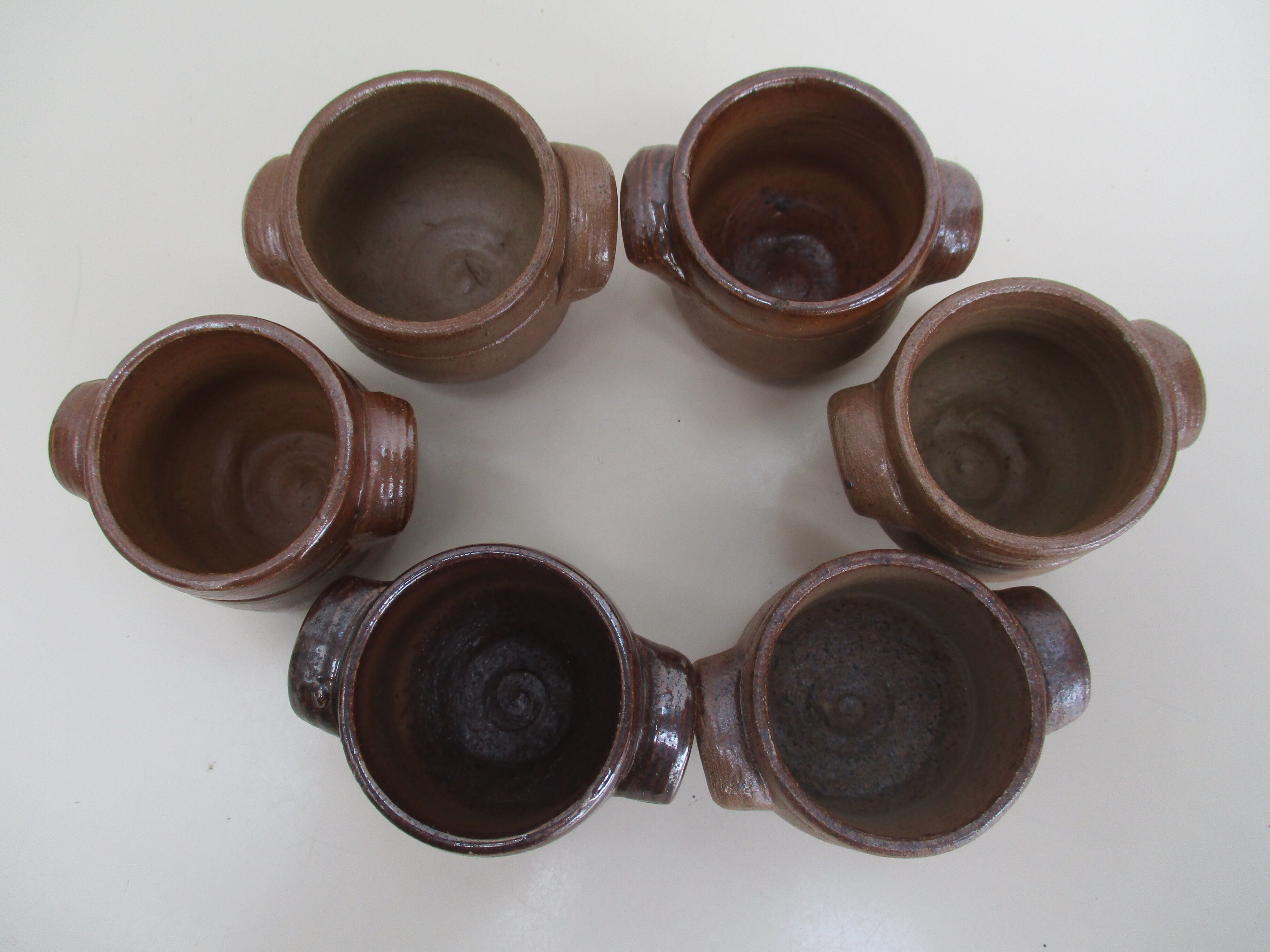 Six sandstone handle pots