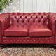 Chesterfield 2-seater leather sofa, modern production from the 2000s.