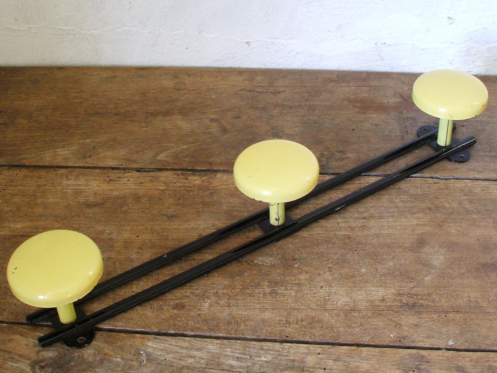 Coat 60 years yellow metal door