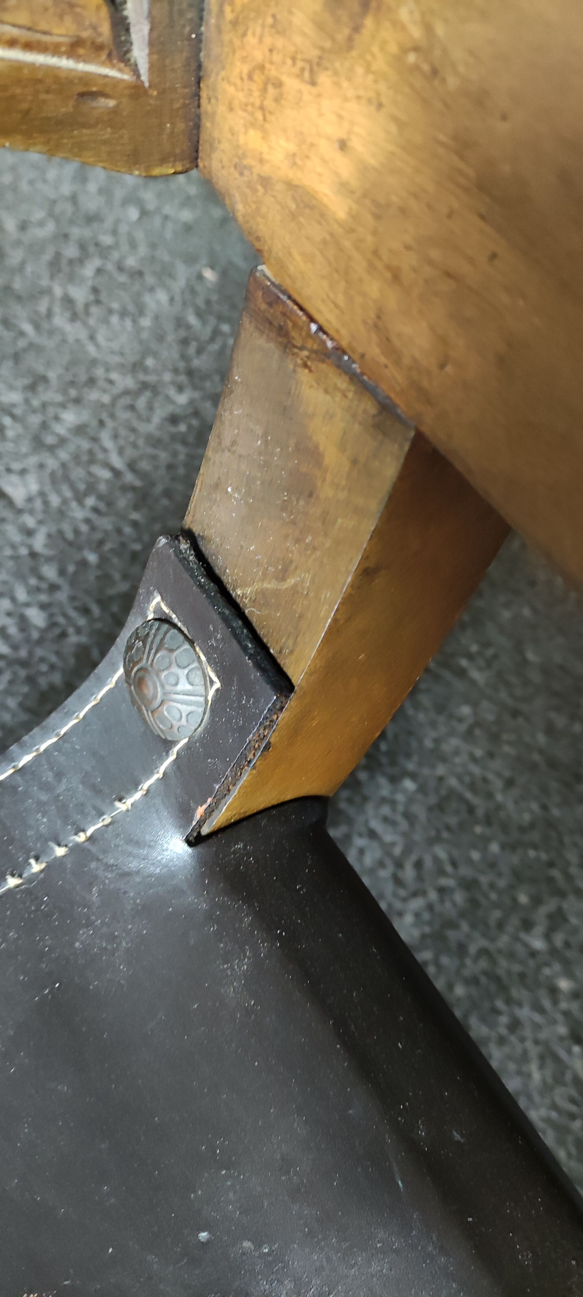 Armchair called Dagobert in wood and leather